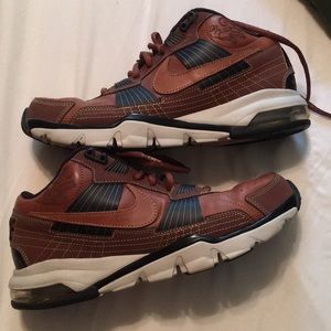Brown and black nike trainers